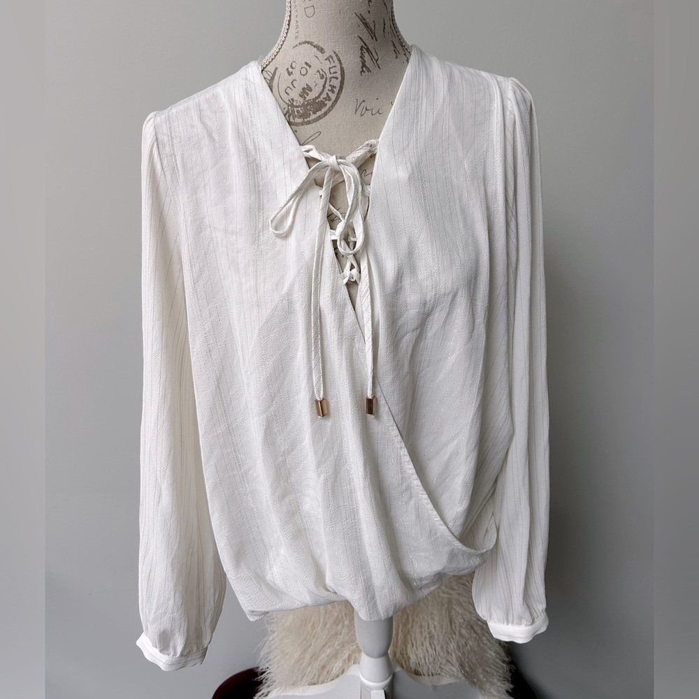 White blouse with gold pinstripes